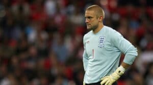 Rob Green, England goalkeeper, looks disappointed after conceding a soft goal