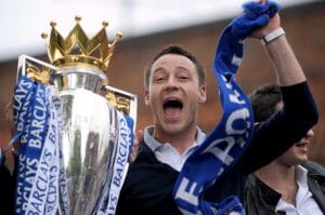 John Terry holding the Premier League trophy in 2010