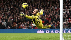 Pepe Reina concedes a goal while playing for Liverpool
