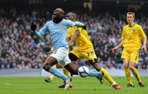 Mario Balotelli dives during a cup game with Manchester City