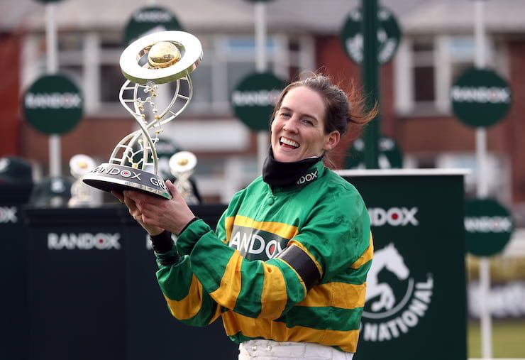 Jockey Rachael Blackmore holds the Grand National trophy in 2021