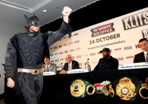Tyson Fury dressed as Batman at a press conference.