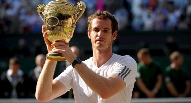 Andy Murray holding the Wimbledon trophy in 2013