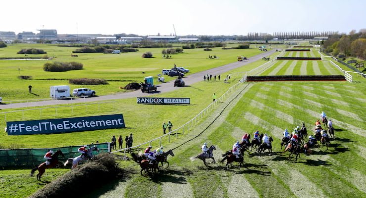 Horses racing at Ladies Day of the Grand National Festival