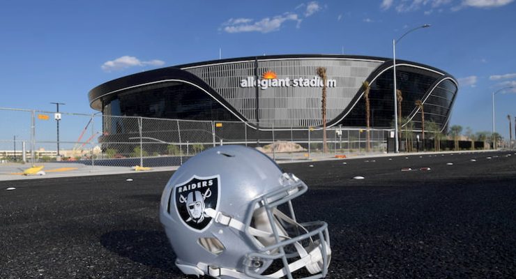 Las Vegas Raiders football helmet in front of the stadium
