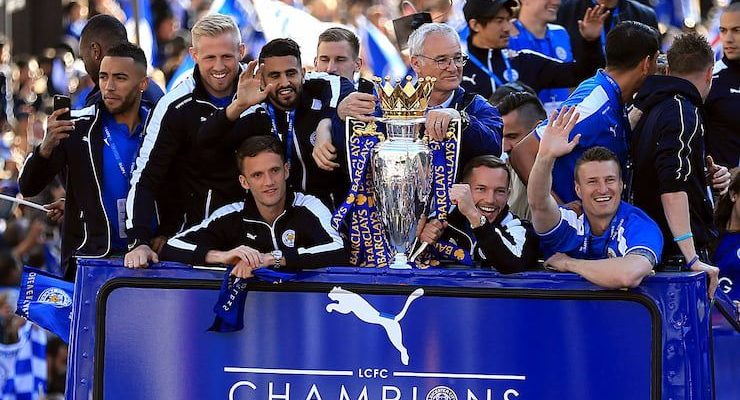 Leicester City players on an open top bus to celebrate winning the Premier League.