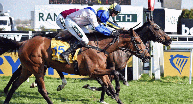 If The Cap Fits leading the 2019 Ryanair Stayers' Hurdle race at Aintree.